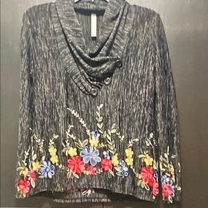 Clarins Black Cowl Neck Sweater with Embroidered Floral Hem
